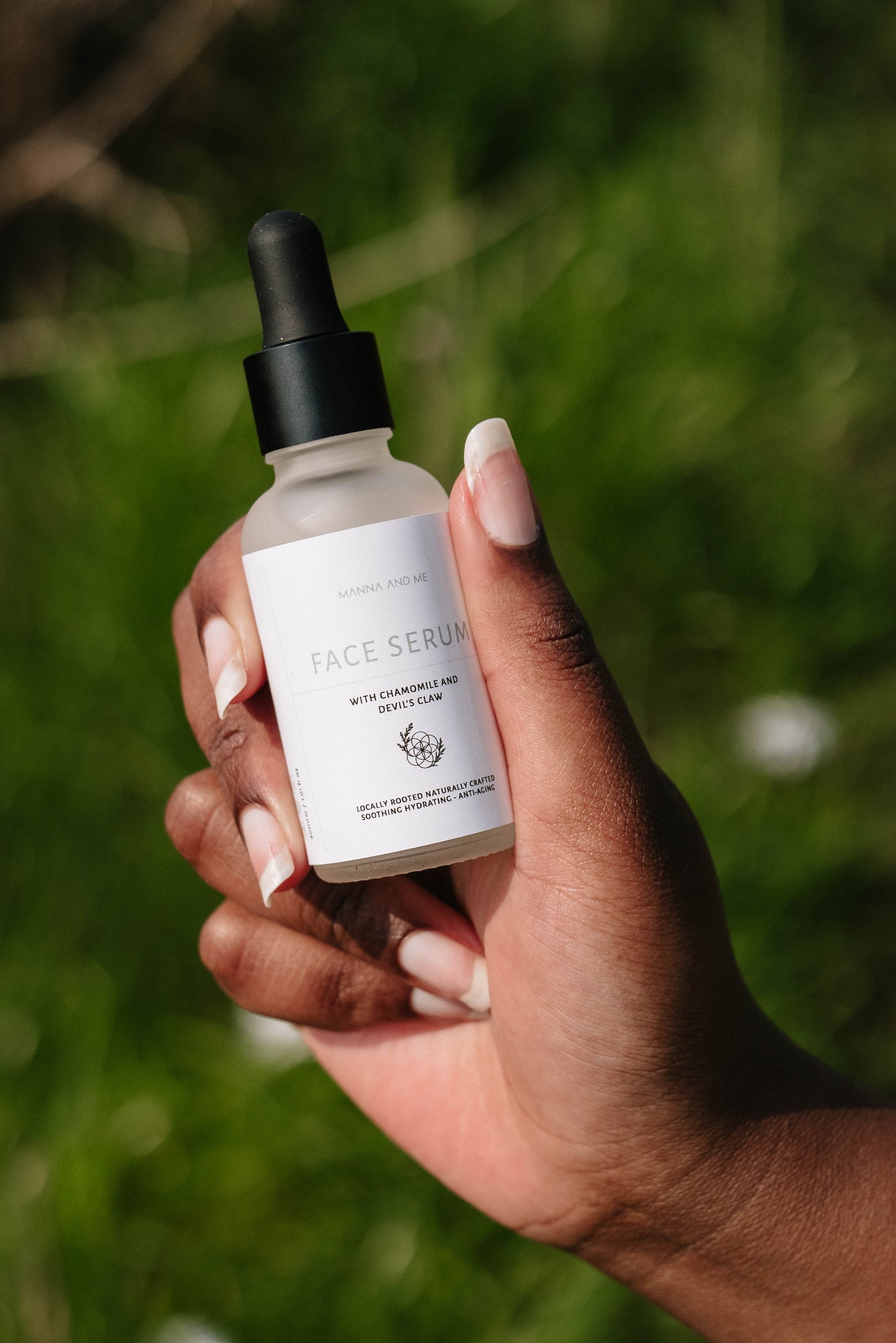 Manna and Me Fortify Skin Serum amber glass bottle with dropper, concentrated botanical formula for barrier repair.