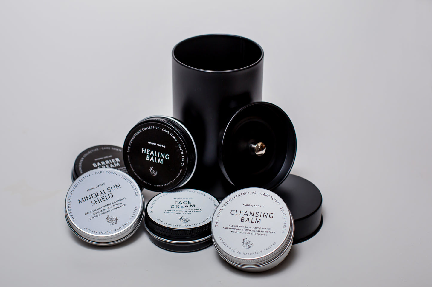 Manna and Me Barrier Cream in a glass jar, a family-safe natural skin food for soothing dry, irritated, and eczema-prone skin.