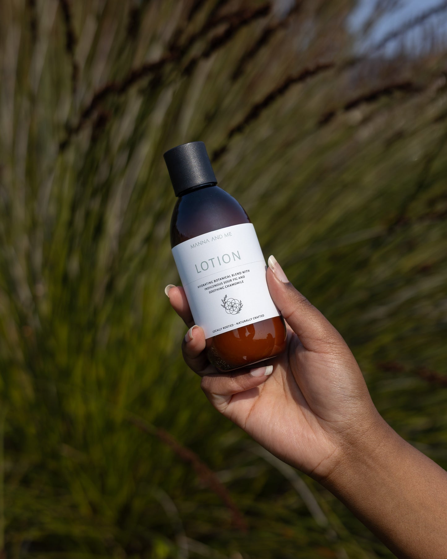 Manna and Me gentle daily Body Lotion bottle for soothing dry, sensitive, and reactive skin.