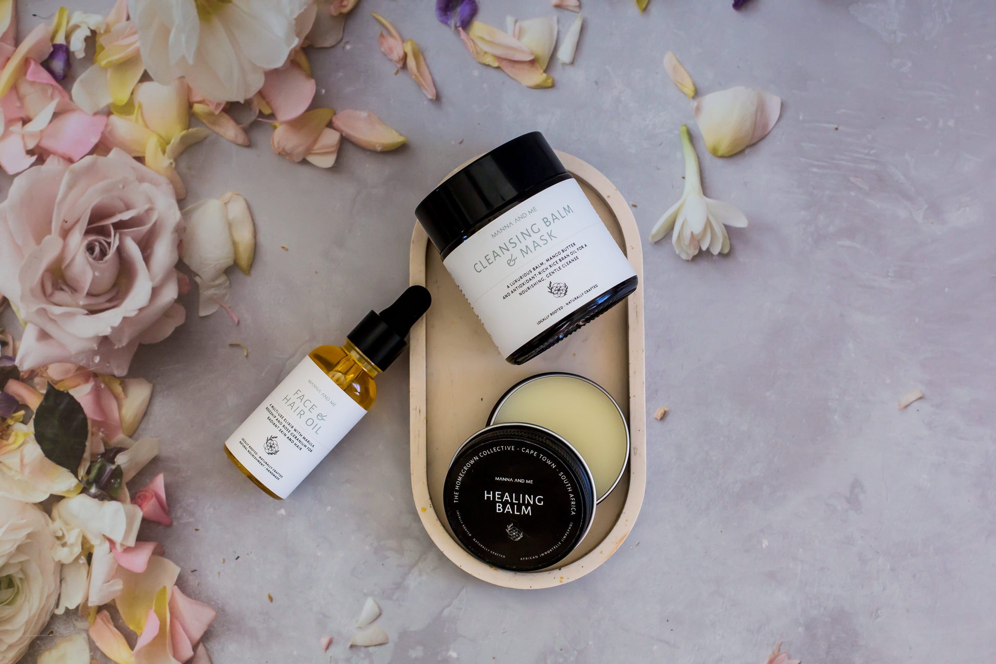 Manna and Me concentrated Face & Hair Oil dropper bottle, restorative South African botanical blend.